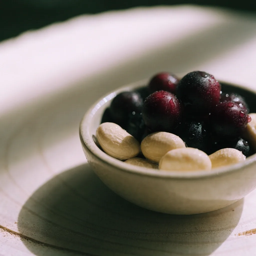 Close macro of lingonberries and soaked beans in a stoneware bowl on birch wood